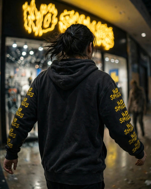 Back of the Barbed Wire Smiley no pocket hoodie, plain back with sleeve prints wrapping into view