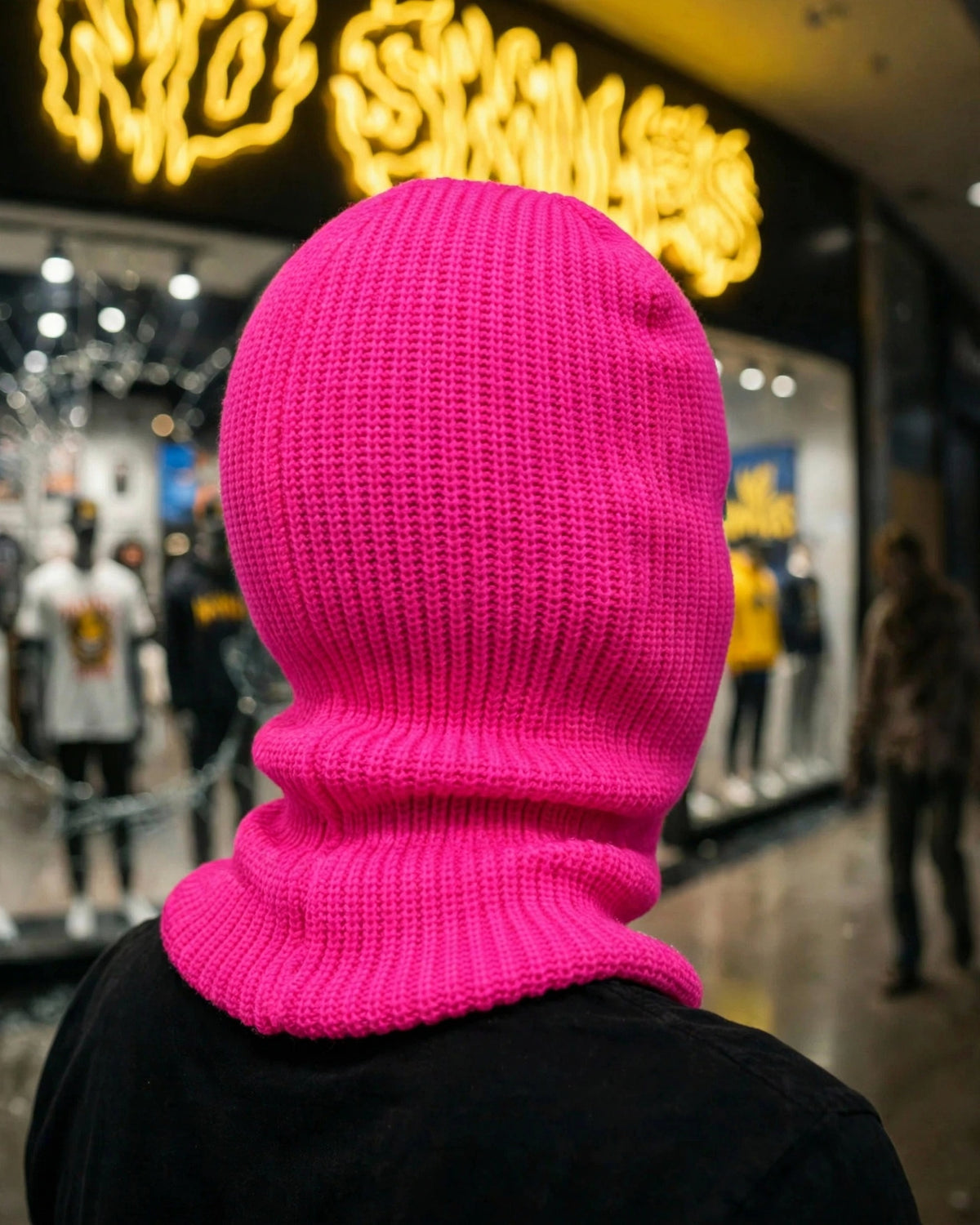 Back of the pink 3-hole ski mask, plain pink knit with no embroidery