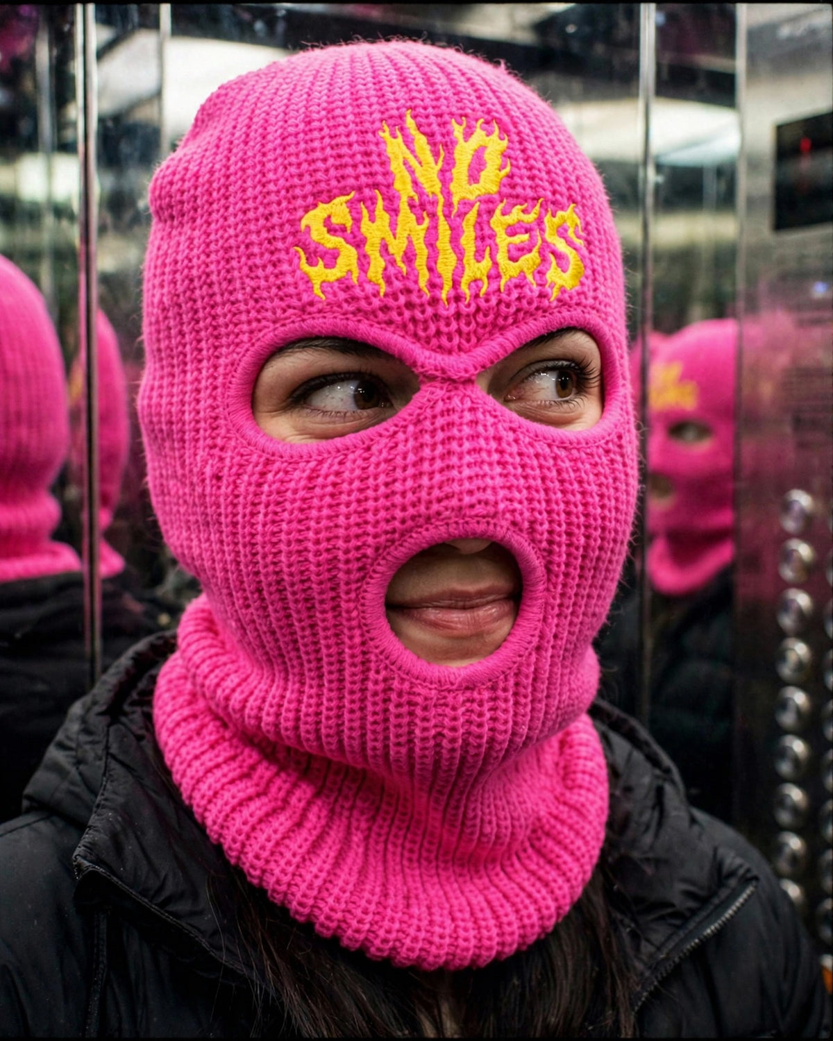 Pink No Smiles ski mask, elevator